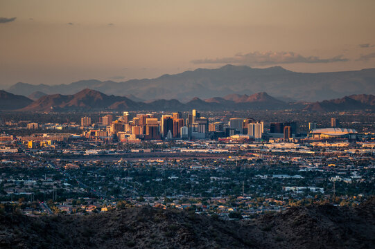  Phoenix Arizona Skyline at Golden Hour Viewed from Dobbins Lookout with Downtown Buildings and Layered Desert Mountains