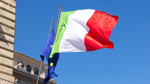 Italian and european flags on a building