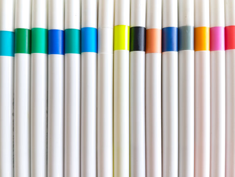 Vertical colorful marker pens isolated on white background