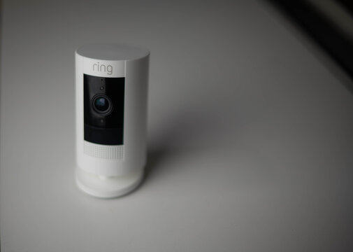 Ring camera on white neutral background, selective focus image, shadow depth of field of view 