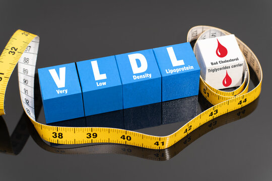 VLDL Cholesterol and Triglycerides Concept With Measuring Tape and Medical Blocks