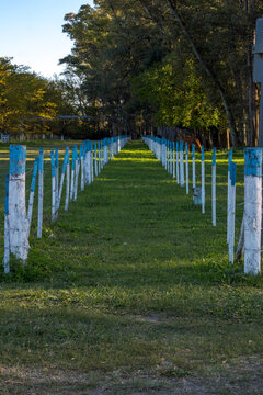 Posts lined up to guide horses in gaucho skills or rein tests, Uribelarrea traditionalist center, Buenos Aires