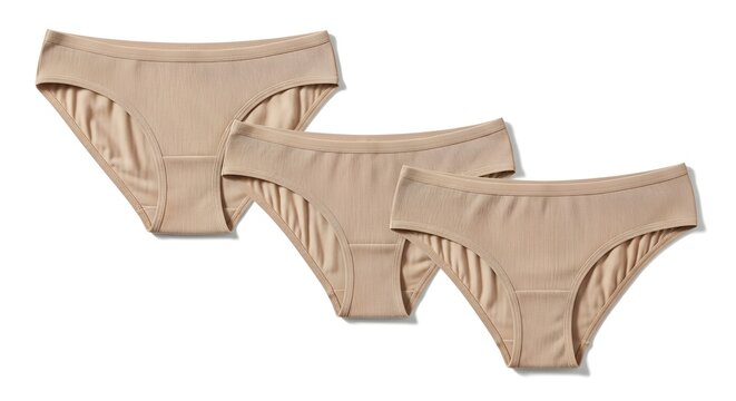 Set of Three Beige Ribbed Seamless Women's Panties on White