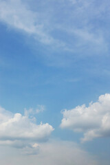 Obraz premium Blue sky background and white clouds soft focus, and copy space