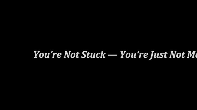 Motivational typography animation with text &ldquo;You&rsquo;re Not Stuck &mdash; You&rsquo;re Just Not Moving&rdquo;, bold italic serif text on black background, cinematic minimalist motion graphics, inspirational mindset quote, 