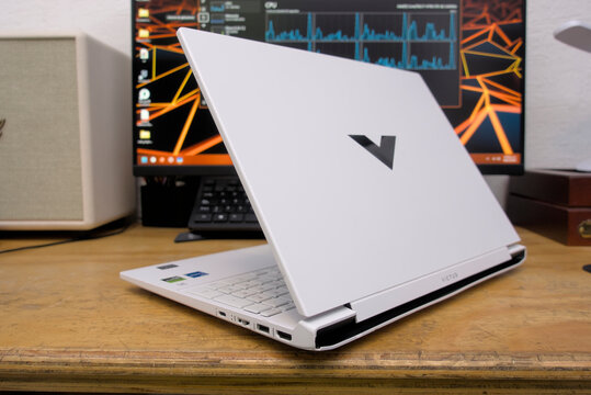 Zapopan Jalisco, Mexico - May 8, 2026: White hp victus gaming laptop on wooden desk, technology concept