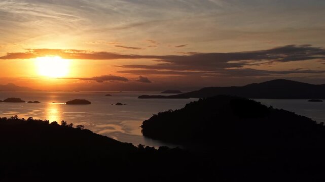 Sunset Reflection Over Tropical Bay