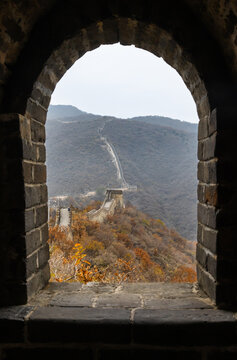 View of the Great Wall of China from window frame within a station