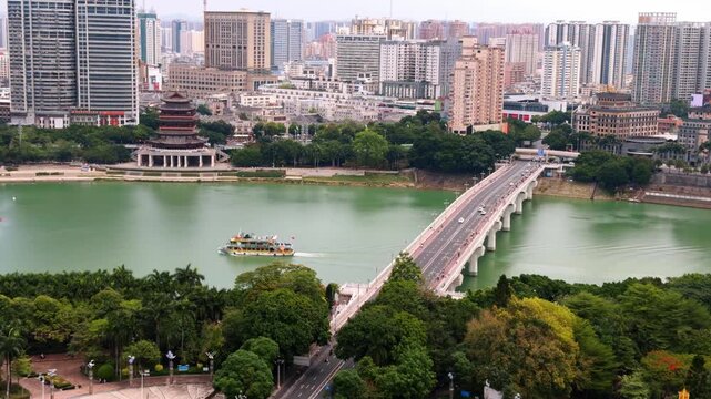 The Yongjiang River Bridge and high-rise buildings along the riverbank in Nanning, Guangxi, China.