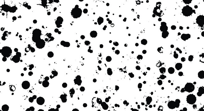 Abstract artistic pattern of black ink splatters and paint drops scattered across a clean white background for a textured grunge effect.
