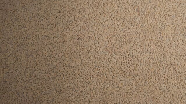 Marco abstract background of warm beige aggregate stone texture with mosaic pattern, natural pebbles, and crushed mineral chips with matte architectural finish for professional design.
