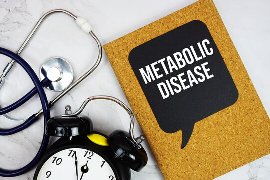 Metabolic Disease text with stethoscope and alarm clock on marble background