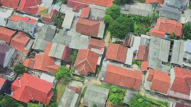 Aerial Drone View of Dense Residential Area with Red Roof Houses in Indonesia