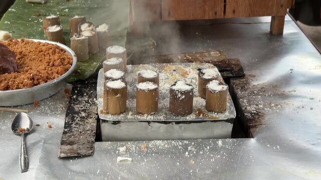 Traditional Indonesian putu cake being steamed.