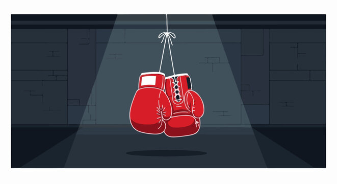 A pair of red boxing gloves hang from a rope in a dimly lit brick room