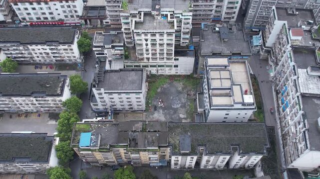 4K aerial video of old urban buildings and aging urban construction