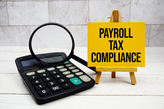 Payroll Tax Compliance text with calculator and magnifying glass