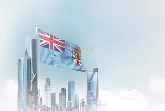 Fiji flag waving with modern futuristic buildings. Fiji national flag beautifully waving in the sky.