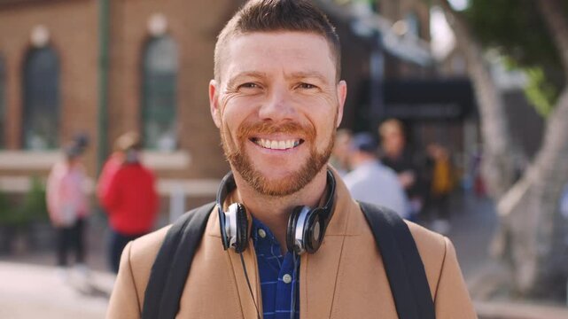 Commute, face or businessman in city with headphones, optimism or morning travel in work routine. Happy, portrait and mature person with tech, employee journey or positive attitude at start of day.