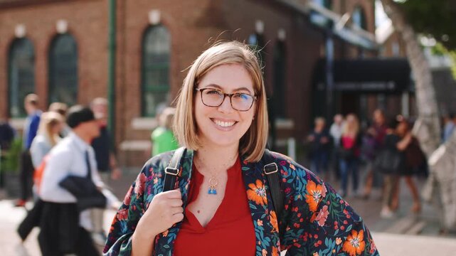 Outdoor, face or woman with confidence for education, study opportunity or international student. Exchange programme, smile or scholar with portrait for abroad travel, cultural knowledge or learning