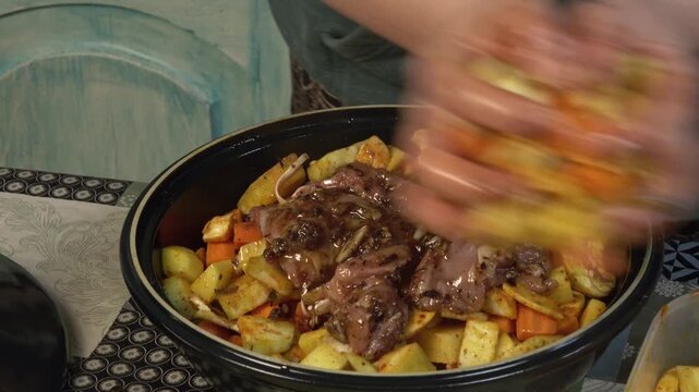 woman in the kitchen preparing food in a tagine
