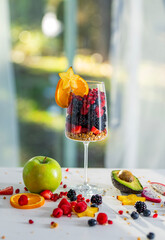 Obraz premium Organic Fruit Mix with Fruits and Berries. Fresh Summer Mix Fruits for Healthy Lifestyle and Detox. Balanced Fruits Diet.