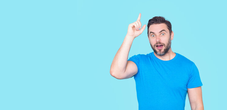 Idea inspiration moment with smart man reaction. Idea concept expression during discovery. Idea creativity portrait with surprised man. Idea symbol showing thinking.