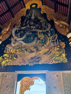Wat Phra That Doi Phra Chan,Lampan,Thailand: It depicts Himmapan,various Naga spirits.The level of detail in the scales of the serpents, the lotus flowers at the bottom,tells a story of the Buddhist 
