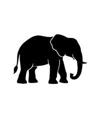 Fototapeta premium A black silhouette of an elephant walks on a plain.