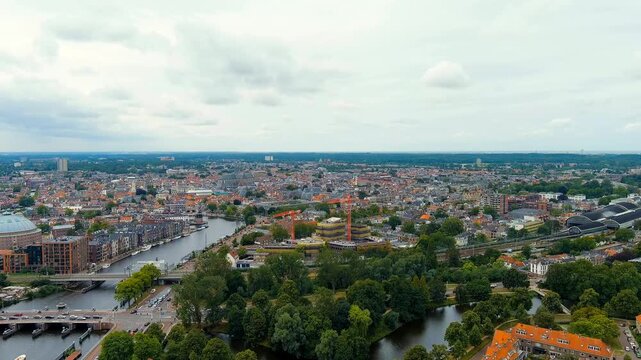 Haarlem, Netherlands. Panoramic view of Haarlem city center. Cloudy weather during the day. Summer. Drone footage