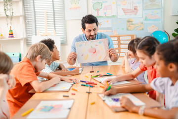 Fototapeta premium Back to school and education concept of teacher children classroom drawing art school education lesson table paper