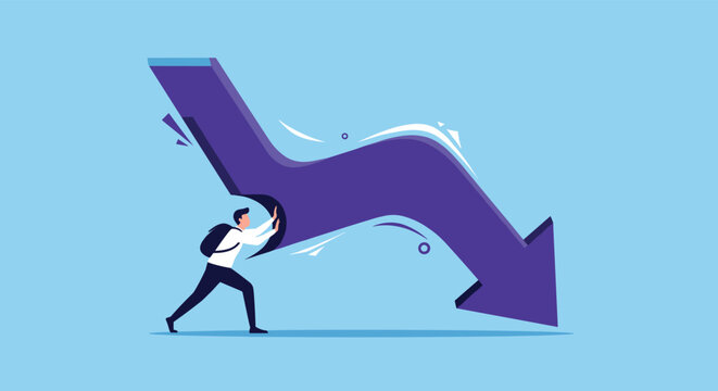 Resilient businessman using his strength to push back against a giant falling arrow to reverse a negative trend.