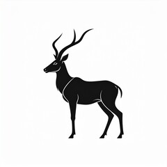Obraz premium Black antelope with large curved horns standing on plain ground