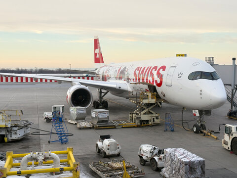 Swiss Airbus A350 special livery Wanderlust illustrates the diversity and beauty of the country Switzerland. Airplane at the gate of YUL Montr&eacute;al-Pierre Elliott Trudeau International Airport