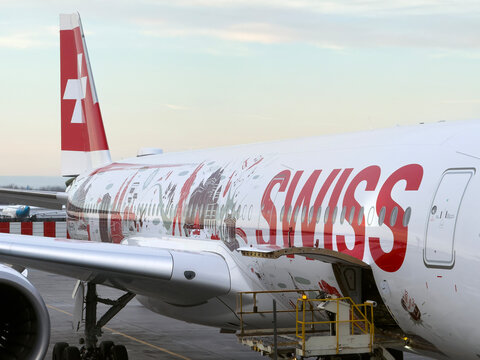 Swiss Airbus A350 special livery Wanderlust illustrates the diversity and beauty of the country Switzerland. Airplane at the gate of YUL Montr&eacute;al-Pierre Elliott Trudeau International Airport