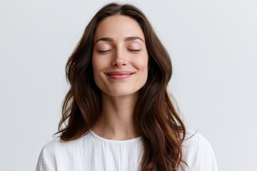 Obraz premium Woman smiling after completing meditation session, peaceful mood, sstkHealth