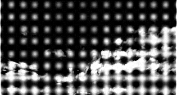 Dramatic sky with clouds and halftone dot effect overlay texture