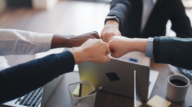 Teamwork and unity, colleagues or partners connecting hands, closeup in office. Team of professionals and co-workers moving to same goals, be together and work hard, employees of international company