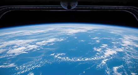 Obraz premium Wide angle shot from a space station observation window looking down at a blue planet with white clouds swirling over a vast ocean surface, craft, flare, immense