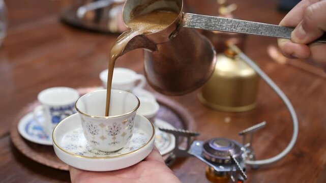 Turkish Coffee Pouring into Traditional Cup &mdash; Close-Up Cinematic Shot