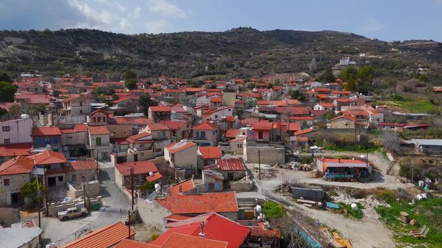 Low Drone Flight Over Historic Stone Houses and Traditional Rooftops in Koilani Village Cyprus