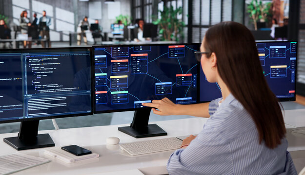 Woman Focused On Visual Programming