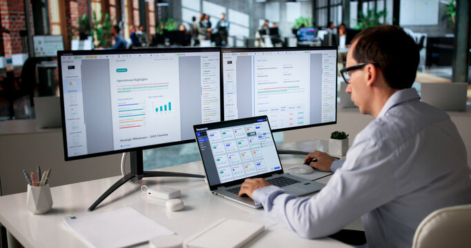 Office Manager Organizes Files On Computer