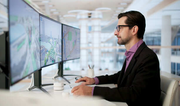 Engineer Uses 3D Software On Desktop