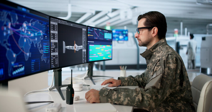 Older Engineer Uses Computer Software