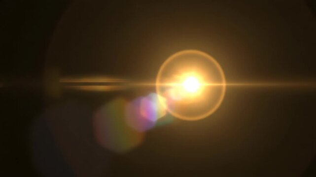 Cinematic golden lens flare with horizontal anamorphic streak. Moving light source overlay on black background. Abstract optical effect for video compositing