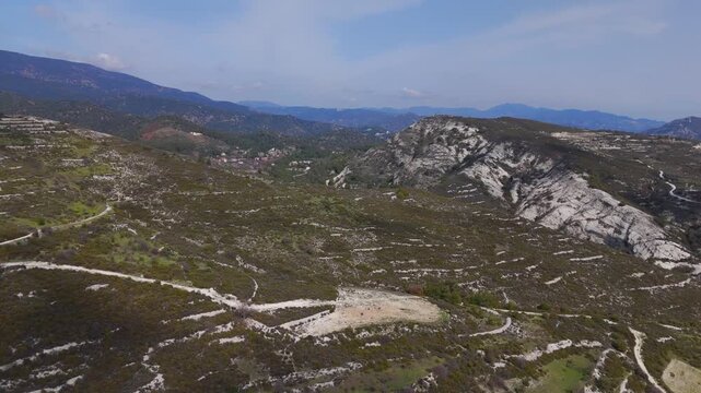 Aerial Reveal of Pera Pedi Village and Deep Troodos Valley Vistas in Cyprus