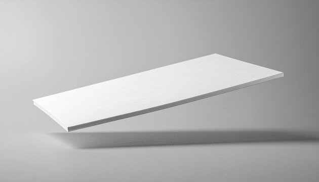 Blank white rectangular board floating above a neutral grey surface with shadow