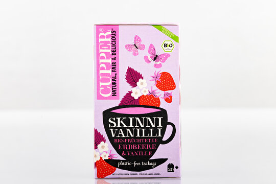 Cupper Skinni Vanilli organic fruit tea with strawberry and vanilla flavor in retail packaging isolated on light background. Illustrative editorial product photography for beverage and wellness concep