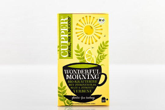 Cupper Wonderful Morning organic herbal tea with lemongrass, mate and lemon verbena isolated on light background. Illustrative editorial studio product photography of packaged tea beverage.